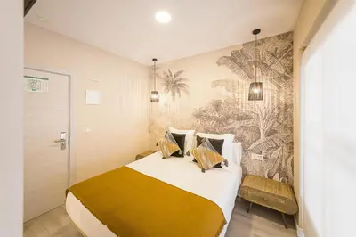 Cama o camas de una habitación en Hostal Plaza Boutique - Solo adultos