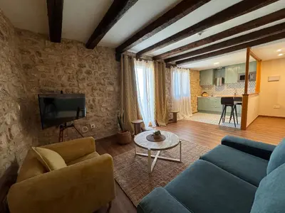 Una televisión o centro de entretenimiento en APARTAMENTOS VILLA DE GOYA