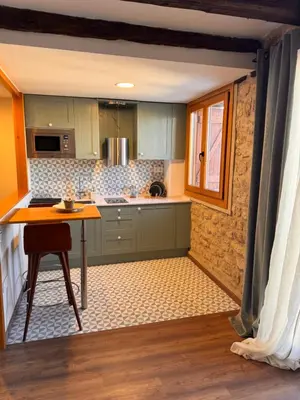 Una cocina o zona de cocina en APARTAMENTOS VILLA DE GOYA