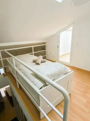 Cama o camas de una habitación en El Loft del Casco by Alogest
