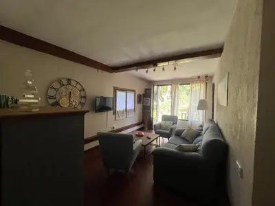 Una televisión o centro de entretenimiento en Apartamentos Casa Gemma