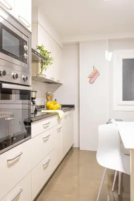 Una cocina o zona de cocina en Los Sauces Pamplona Hospitales Universidad