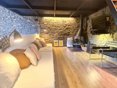 Zona de estar de Paller rústic de muntanya amb estil i acollidor by RURAL D'ÀNEU