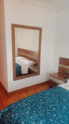 Cama o camas de una habitación en Habitación Renfe