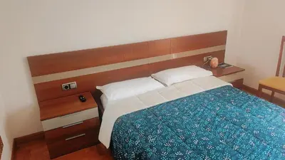Cama o camas de una habitación en Habitación Renfe