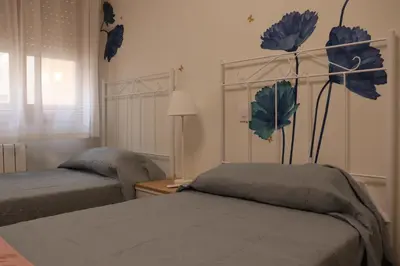 Cama o camas de una habitación en Apartamento El Mercado