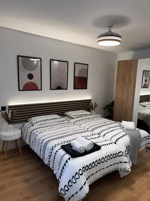 Cama o camas de una habitación en La Plaza del Pilar