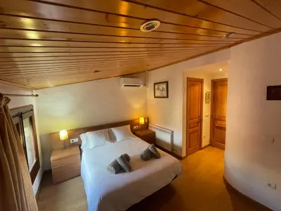 Cama o camas de una habitación en EVA & TRAVEL - CAL MARCEL - Habitacion