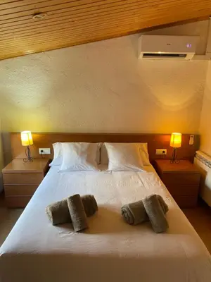 Cama o camas de una habitación en EVA & TRAVEL - CAL MARCEL - Habitacion