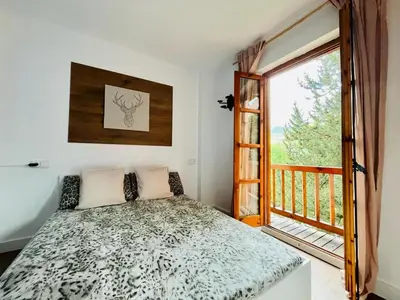 Cama o camas de una habitación en Encantador Apartamento en Pla de l’Ermita