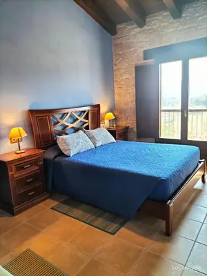 Cama o camas de una habitación en La Contrada