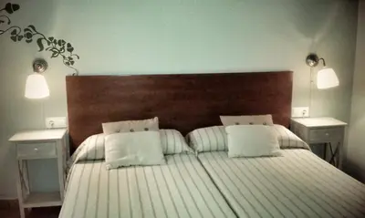 Cama o camas de una habitación en B&B Ra Tenaja