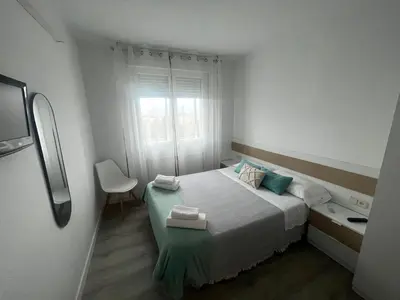 Cama o camas de una habitación en Pensión Luzía - Optional Auto Check-in