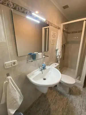 Un baño de Pensión Luzía - Optional Auto Check-in