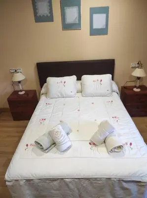 Cama o camas de una habitación en Casa Rural La Maestra