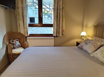 Cama o camas de una habitación en Boira, ideal familias, preciosas vistas, garaje incluido