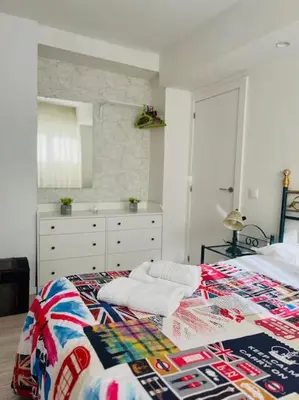 Cama o camas de una habitación en El Jardín de Paula