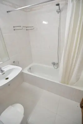 Un baño de Hotel Rooms Ducay