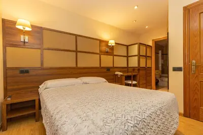 Cama o camas de una habitación en Hotel Solana