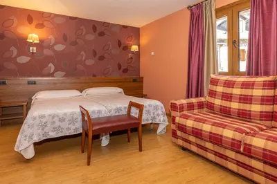 Cama o camas de una habitación en Hotel Solana