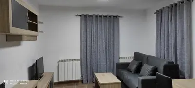 Una televisión o centro de entretenimiento en Casa Xavier - Apartamento 2