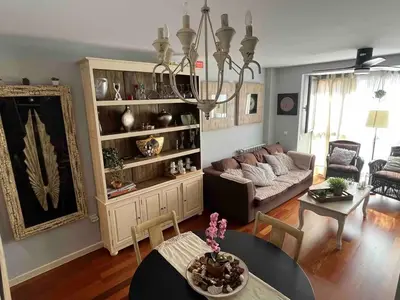 Zona de estar de Triplex Deluxe con terrazas al Pirineo y Golf