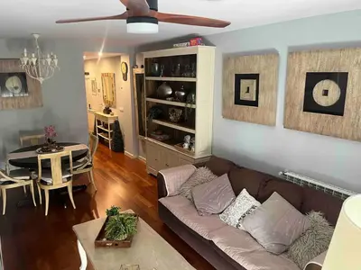 Zona de estar de Triplex Deluxe con terrazas al Pirineo y Golf