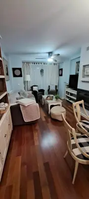 Una televisión o centro de entretenimiento en Triplex Deluxe con terrazas al Pirineo y Golf