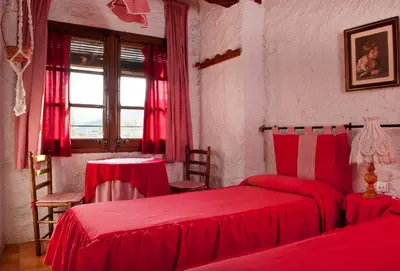 Cama o camas de una habitación en Cal Mateu, Casa de Pagès