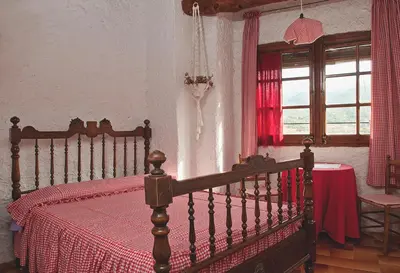 Cama o camas de una habitación en Cal Mateu, Casa de Pagès