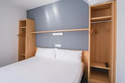 Cama o camas de una habitación en Alda Egues Rooms
