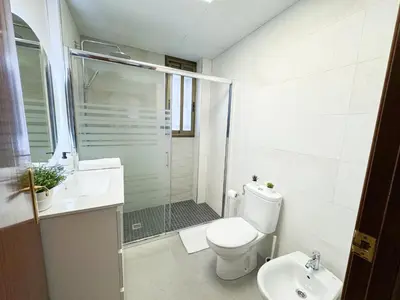 Un baño de La Paloma del Pilar - Turistea Suites
