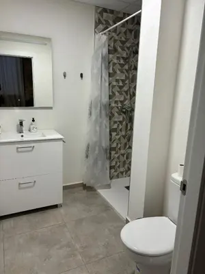 Un baño de La Fusteria d' Arnes