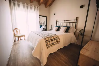 Cama o camas de una habitación en Alojamiento Turístico LAbellaVILLA