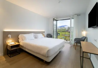 Cama o camas de una habitación en Hotel Trinkete