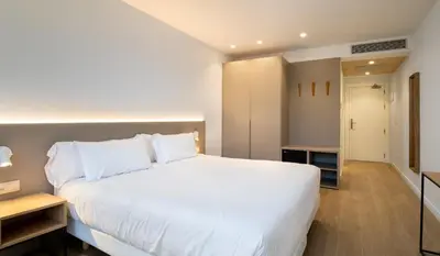 Cama o camas de una habitación en Hotel Trinkete