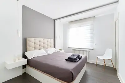 Cama o camas de una habitación en Tranquilo Apartamento en pleno corazón de Pamplona