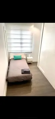 Cama o camas de una habitación en Tranquilo Apartamento en pleno corazón de Pamplona