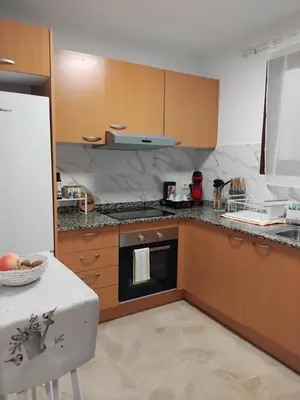Una cocina o zona de cocina en Apartamento Confort II