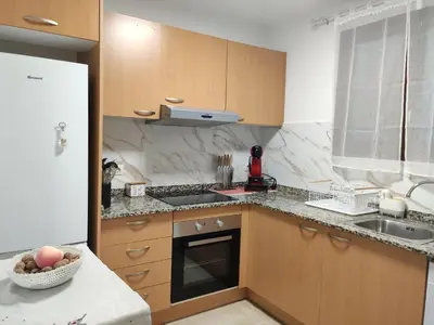 Una cocina o zona de cocina en Apartamento Confort II