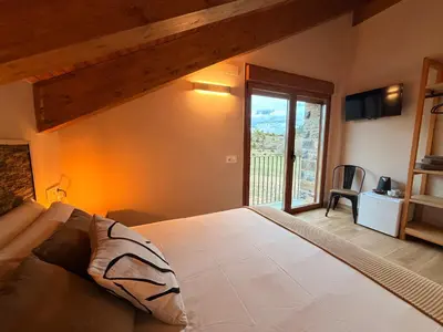 Cama o camas de una habitación en As Fuebas de Patricio