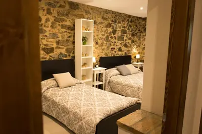 Cama o camas de una habitación en MAS ALSERA. Masoveria d'Agroturisme