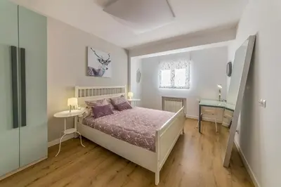 Cama o camas de una habitación en Apartamento con terraza