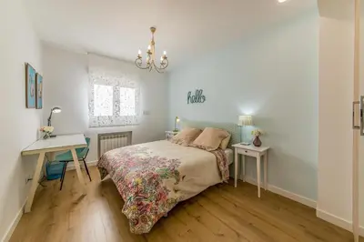 Cama o camas de una habitación en Apartamento con terraza