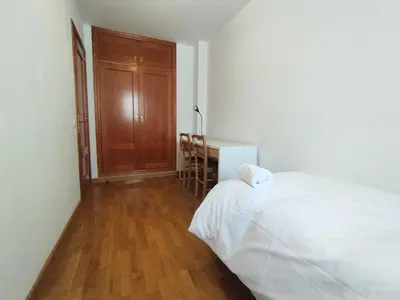 Cama o camas de una habitación en CHECK-IN CASAS Ibon