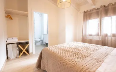 Cama o camas de una habitación en El sueño del Búho 6. Ático con chimena