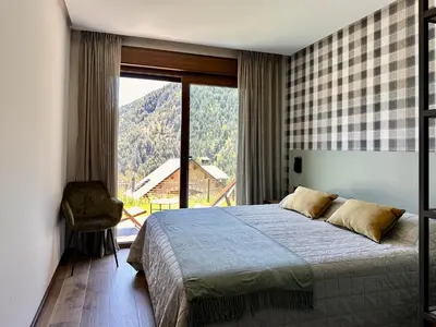 Cama o camas de una habitación en BOJ Casas de Montaña
