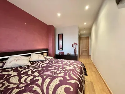 Cama o camas de una habitación en Apartamentos Ciudad del Calzado