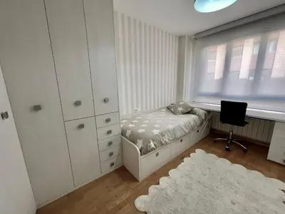 Cama o camas de una habitación en Apartamentos Ciudad del Calzado