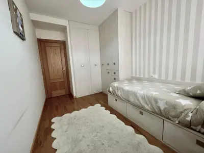 Cama o camas de una habitación en Apartamentos Ciudad del Calzado